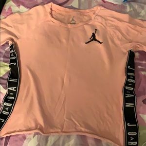 Size small, a Jordan light pink top